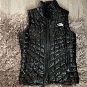 Black quilted north face vest size xs